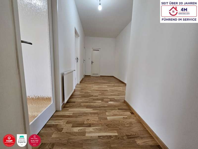 Wohnzimmer - Eigentumswohnung Wien - Bild 1