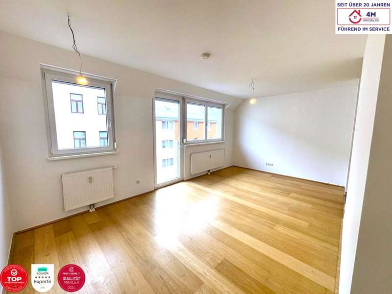 Wohnzimmer - Eigentumswohnung Wien - Bild 1