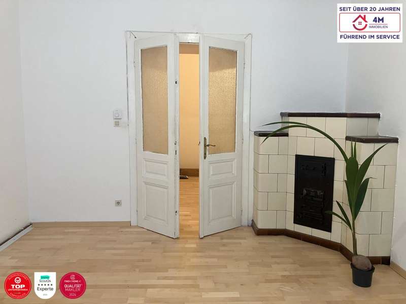Wohnzimmer - Eigentumswohnung Wien - Bild 1