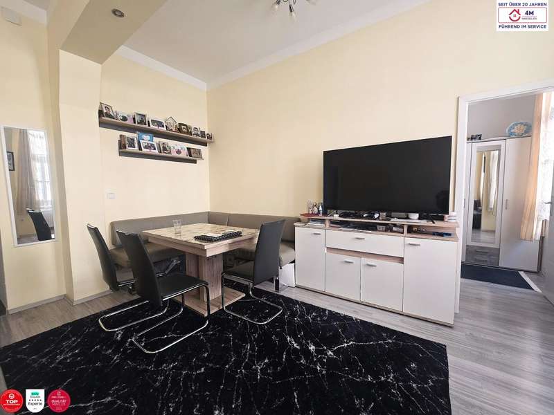 Wohnzimmer - Eigentumswohnung Wien - Bild 1