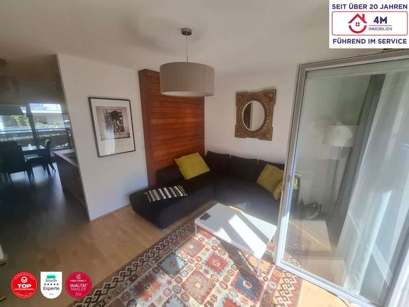 Wohnzimmer - Eigentumswohnung Wien - Bild 1