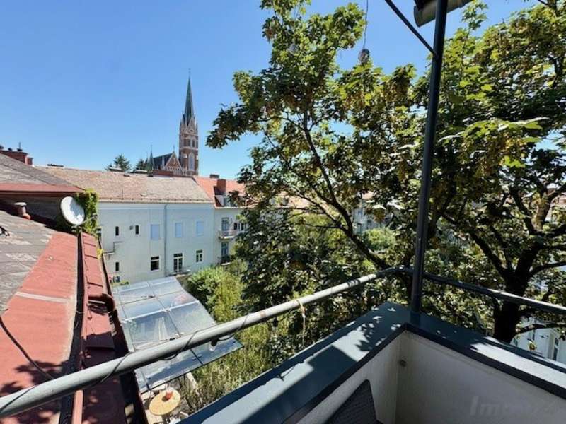 Terrasse mit Blick zur Herz-Jesu-Kirche - Penthouse Graz - Bild 1
