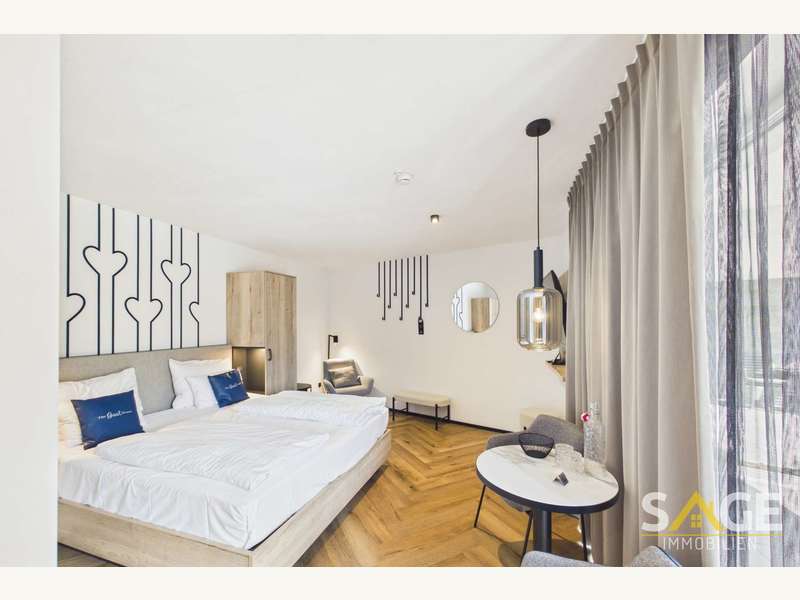 Schlafzimmer - Renditeobjekt Zell am See - Bild 1